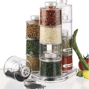 12 self-stacking acrylic spice bottles on easy-access revolving base. NWOT